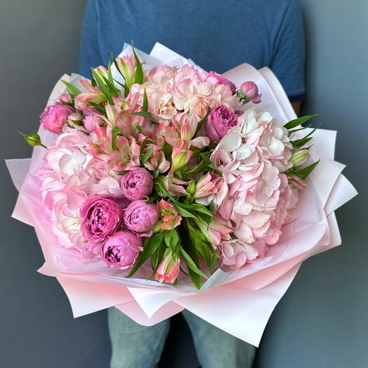 A gorgeous bouquet of hydrangeas, bushy peony roses and alstroemeria