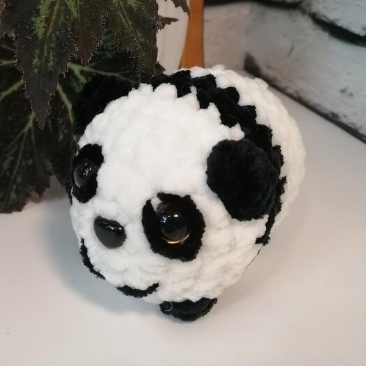 Panda is a handmade plush toy