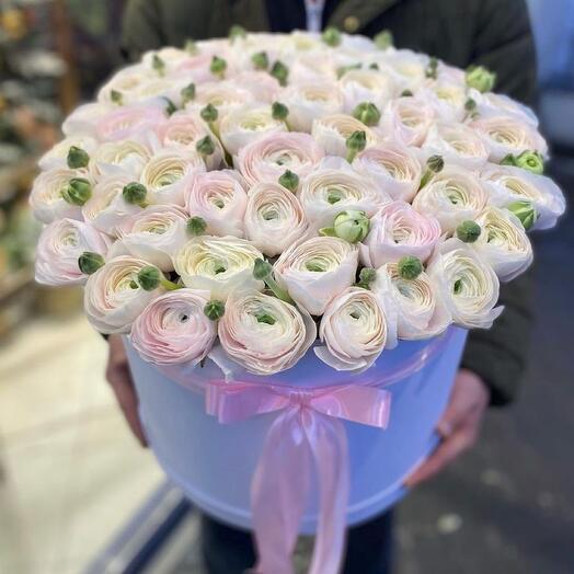 Bouquet of ranunculus in a hat box