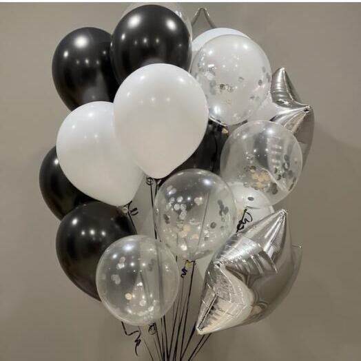 A large bundle of mixed balls: black balls, white, transparent, silver