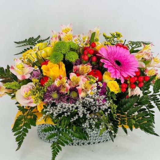 Bouquet of flowers in a knitted basket