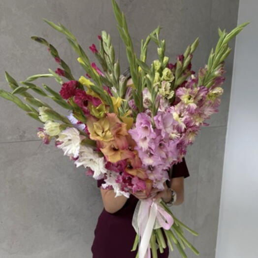 A bouquet of 15 multi-colored gladioli