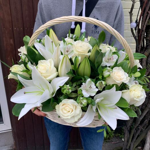 Basket with white roses, lilies and alstroemeria "Spring garden"