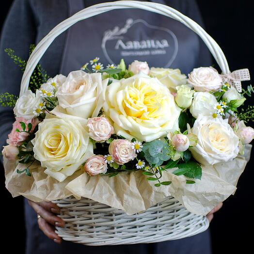 A basket of fragrant roses in Provence style