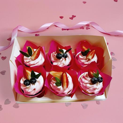 Cupcakes with berry decorations. For a birthday present. For mom/sister/friend/grandmother/daughter