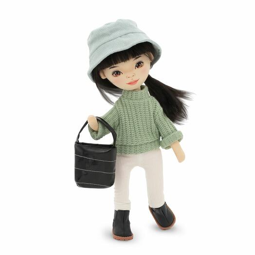 Lily in a green sweater