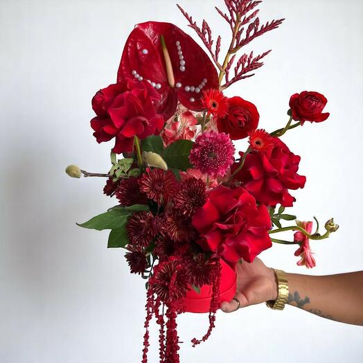 Between the Pages – Dramatic Red Floral Arrangement