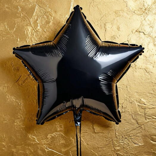 Black star helium foil balloon.