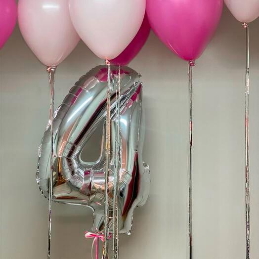 Helium balloons under the ceiling and a number