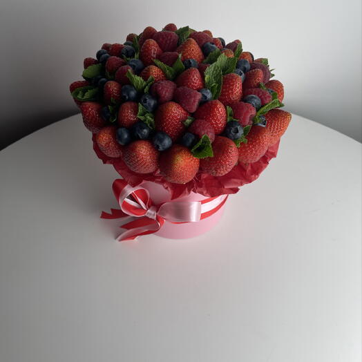 Bouquet of juicy berries of fresh strawberries raspberries blueberries