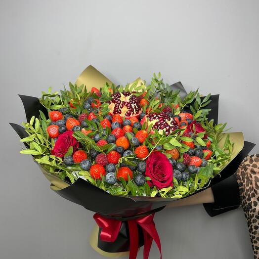 Bouquet with pomegranate , strawberry , blueberry