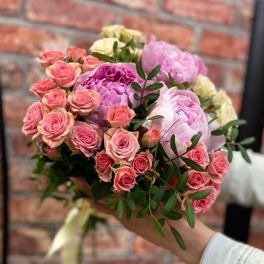 Bouquet with peonies and bush rose