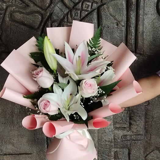 Pink Beauty: 3 Stems of Pink Lilies   10 Stems of Pink Roses in a nice pink wrapping