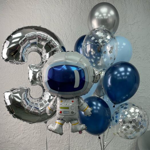 A set of Balls with a number and an astronaut for a birthday boy