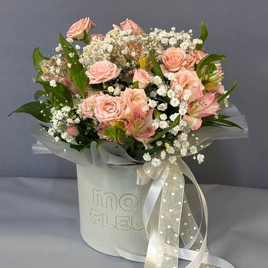 Floral arrangement with garden roses and alstroemeria