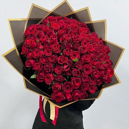 Bouquet of 101 red roses in a dark design