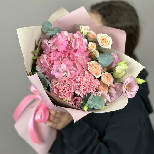 Bouquet of Summer blues made of hydrangeas and bush roses