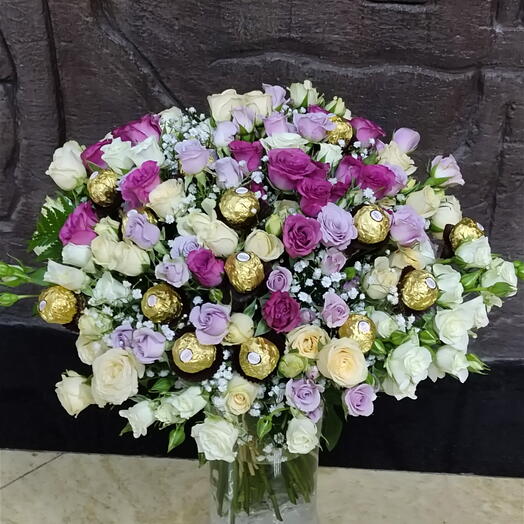 Truly Magical Combo:40 Stems of mix  Spray Roses   Ferrero Rocher Chocolate Sticks in a vase