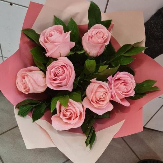 7 pink roses with greenery