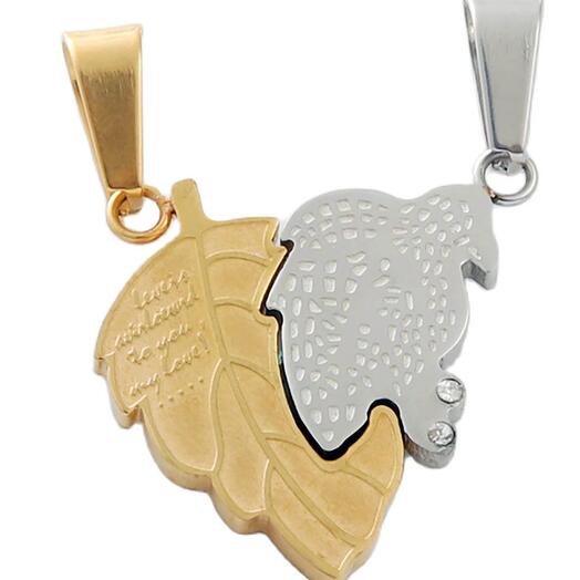 DC120 Парные кулоны серебристо-золотые "Листики"