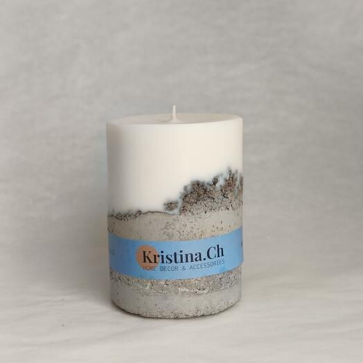 Candle on concrete