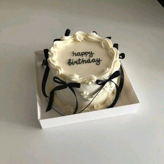 Bento cake with black bows