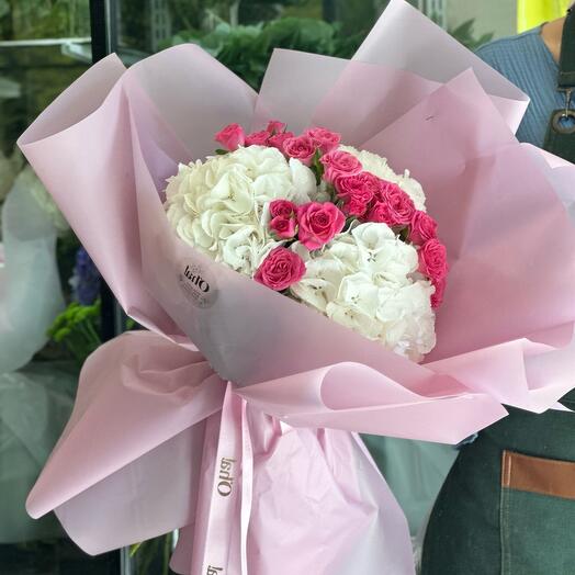 White hydrangeas and sprey roses bouquet