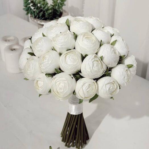 Wedding bouquet of white ranuculus