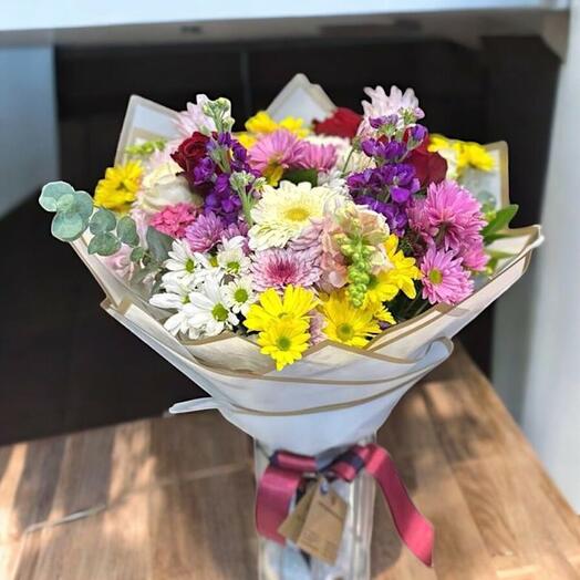 Colorful wildflowers and roses