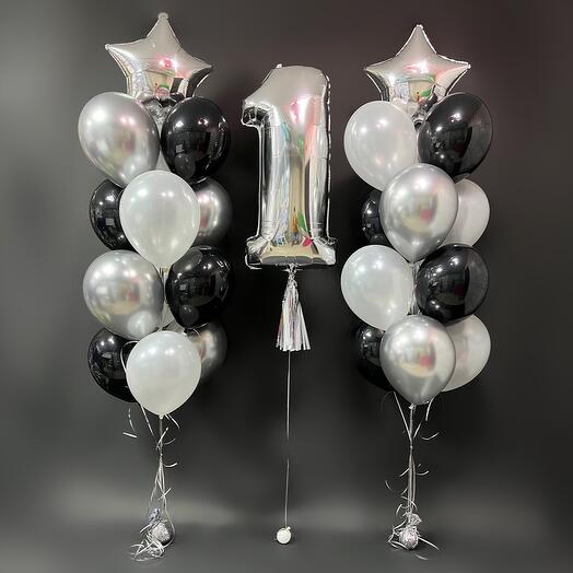 Balloons are black and silver chrome with a number