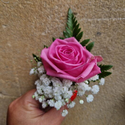 Fresh rose buttonhole