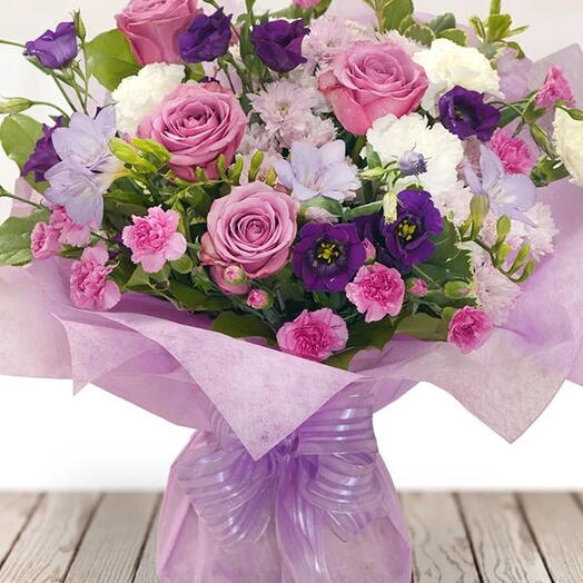 Purple Sky: 20 Purple Roses, 6 Stems Purple Estoma, 5 Stems Baby Carnations   Seasonal Greens