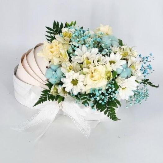 Bouquet of flowers for discharge from the hospital in a gift box cradle