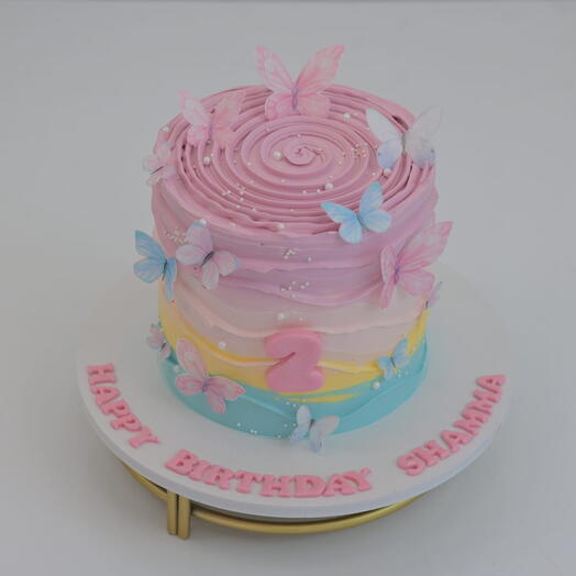 Enchanting Pastel Pink, Blue, and White Onbree Butterfly Cake for Your Baby Girl s Birthday