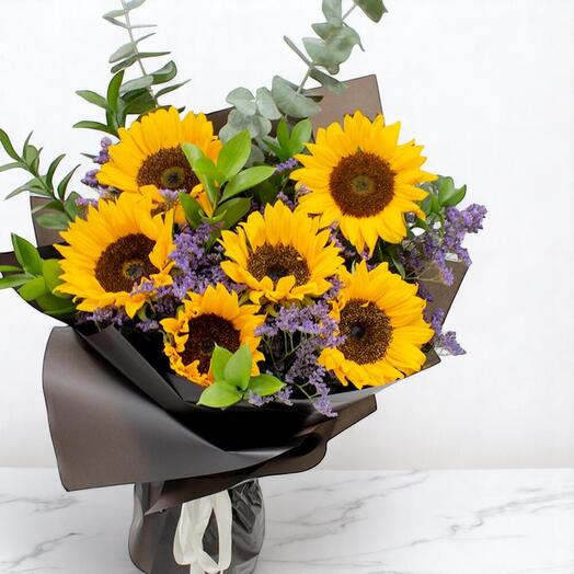 Sunshine Bloom – 6 Sunflowers with Purple Fillers in Elegant Black Wrapping