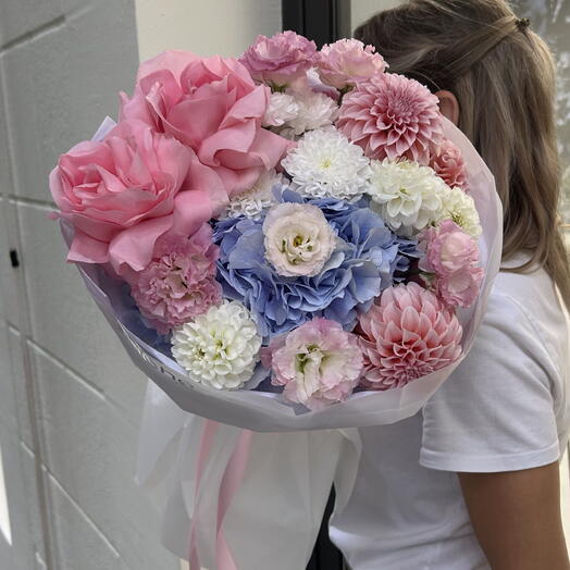 Pink bouquet with blue hydrangeas
