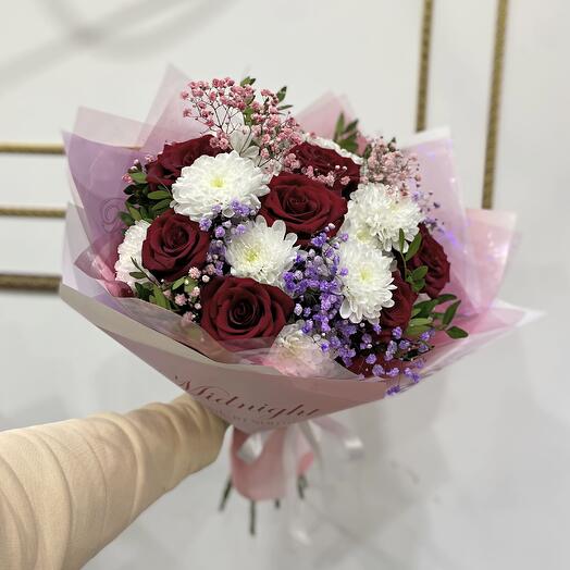 A bright bouquet for your beloved with roses and chrysanthemums