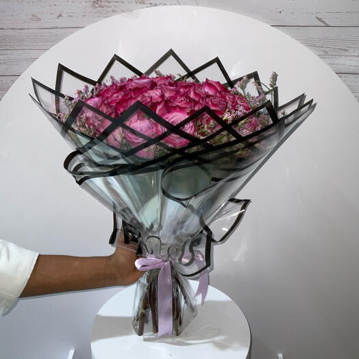 Clear purple rose bouquet