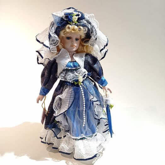 Кукла из керамики в синем платье