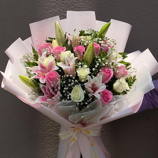 Heaven scent: 4 STEMS OF PINK LILY 8 STEMS OF WHITE ROSES AND 8 STEMS OF PINK ROSES