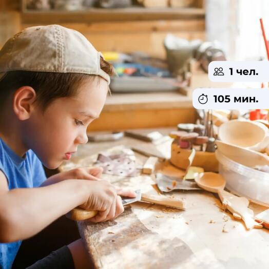 A young carpenter. Carpentry workshop