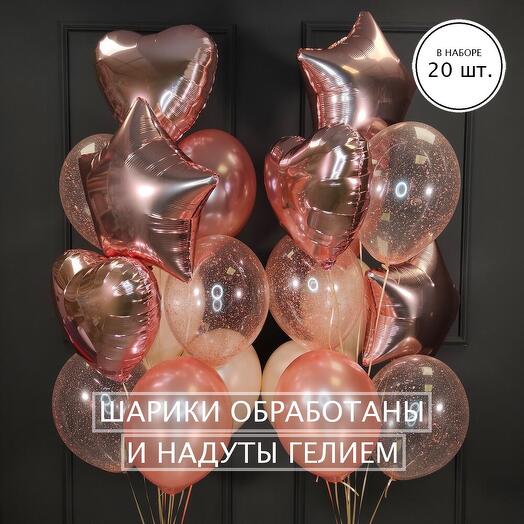 Composition of rose gold balloons with hearts and stars
