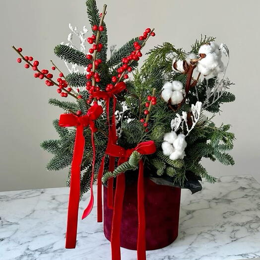 Caja de flores navideña