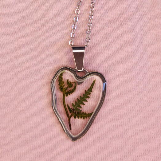 Stainless steel heart pendant with fern