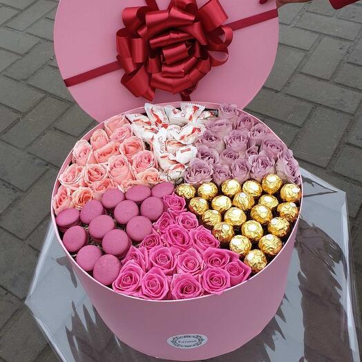 Flowers in a box with sweets