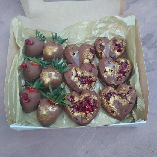 Chocolate-covered strawberries and pomegranates