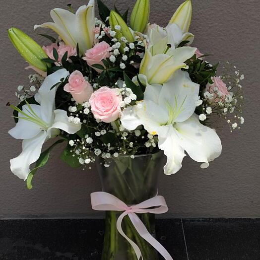 Love Token; 2 stems of White Lillies and 8 Pink Rose in a glass vase