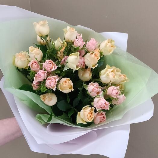 Bushy peach and pink roses