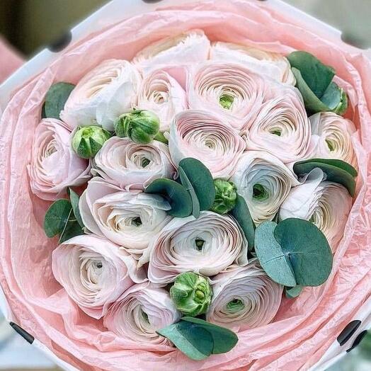 Bouquet of white ranuculus and eucalyptus