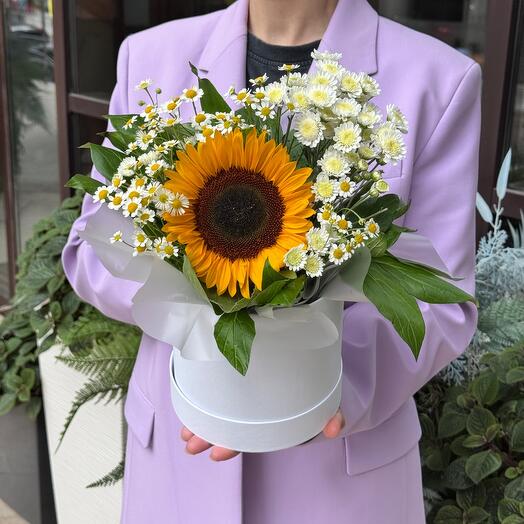 Sunflowers with chamomile in a box